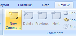 Click the cell. Click the Review tab. Then click the New Comment button.