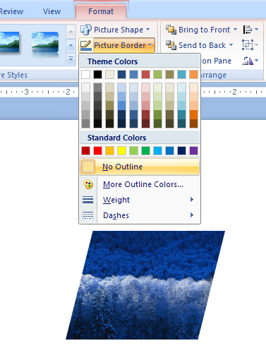 Select the picture, click the Format tab, click the Picture Border button, and then click No Outline.