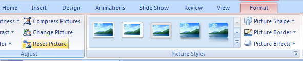Select the picture, click the Format tab, and then click the Reset Picture button.