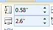 Click the Up and Down arrows for the Table Row Height and Table Column Width.